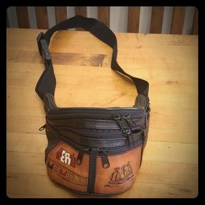 Leather fanny pack from Peru with multiple pockets
